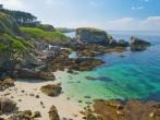The image of a wild beach with emerald water in the coast of island Belle Ile en Mer. France; 