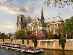 Paris, Notre Dame  with boat on Seine, France.
